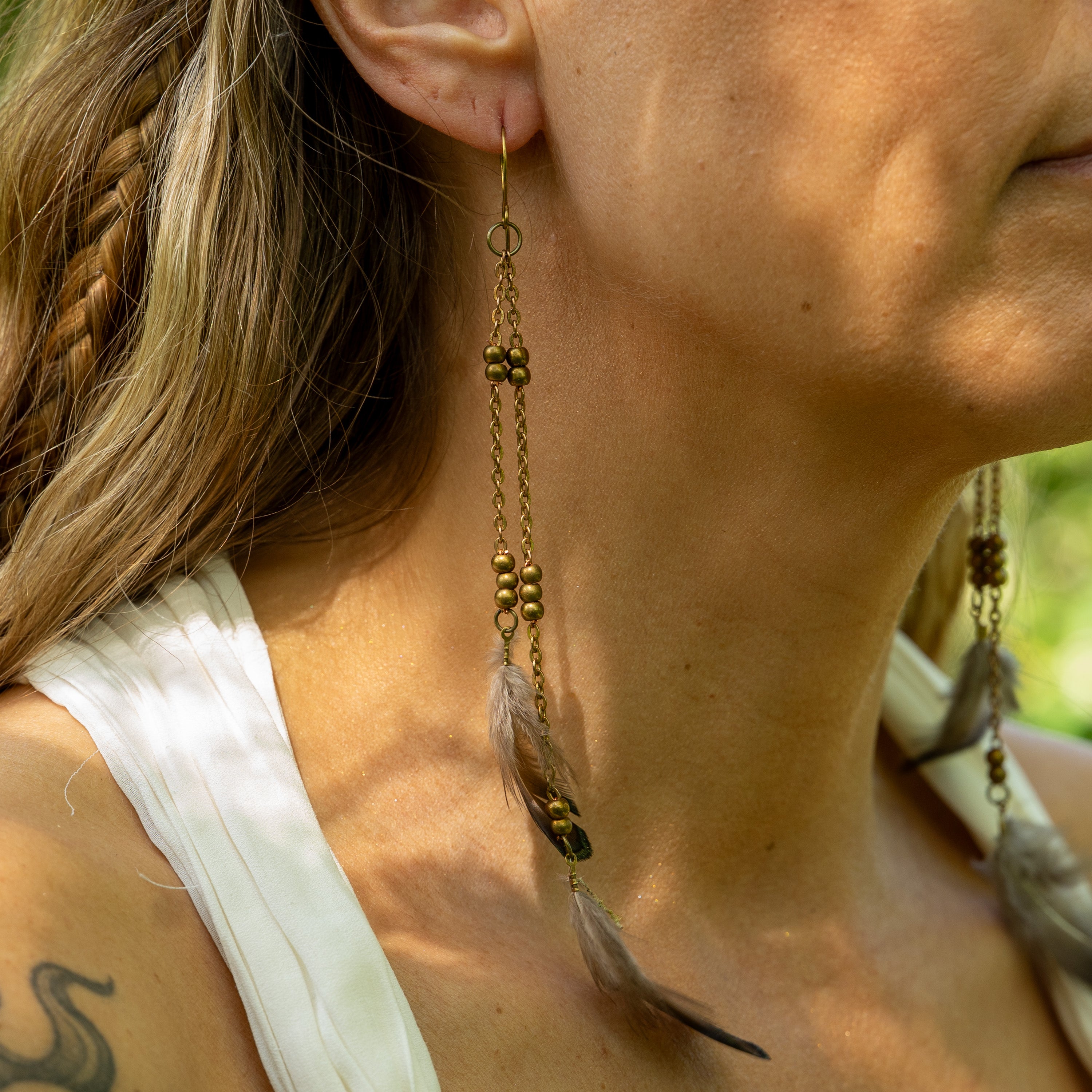 Flowing Feather Earrings in Bronze